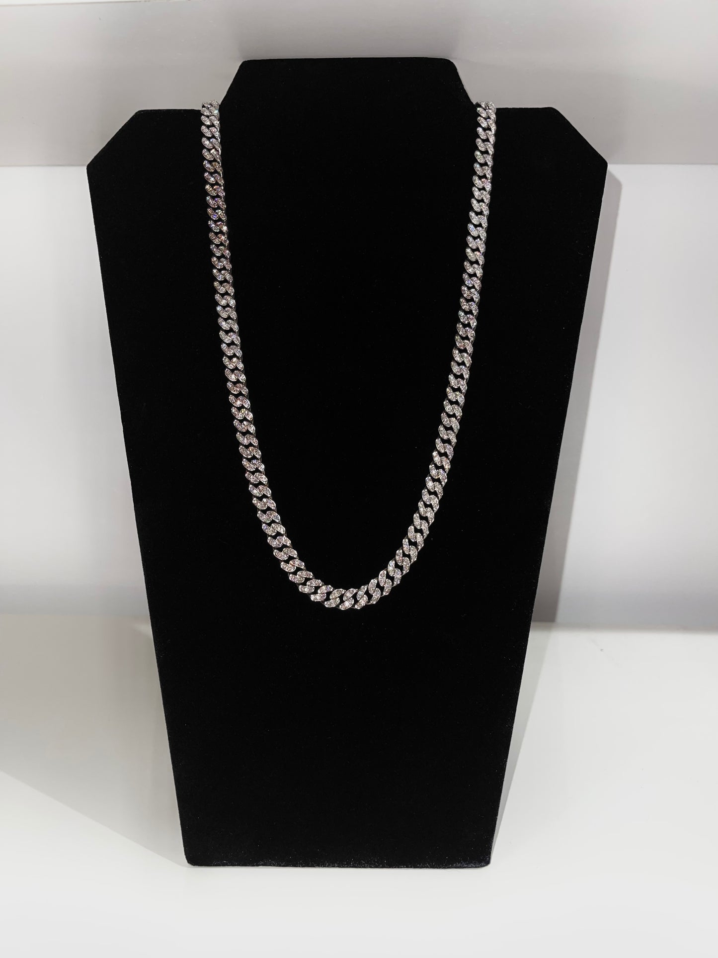 15 karat silver diamond chain.